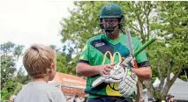  ?? GRANT MATTHEW/FAIRFAX NZ ?? Stags batsman Jesse Ryder signs an autograph for a young fan after being dismissed for a duck.