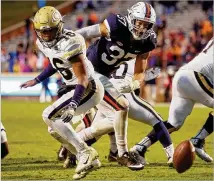  ?? RYAN M. KELLY / GETTY IMAGES ?? Quarterbac­k TaQuon Marshall and the Jackets are running out of chances to get enough wins to become eligible for a bowl. Tech hosts No. 17 Virginia Tech on Saturday.