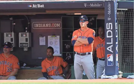  ??  ?? Houston Astros manager AJ Hinch looks on from the dug out during Game 3 of the ALDS against the Indians on Oct. 8 in Cleveland. KEN BLAZE/USA TODAY SPORTS