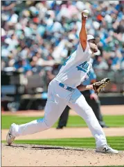  ?? TONY AVELAR/AP PHOTO ?? Oakland Athletics pitcher Jesse Hahn, the ex-Fitch High School star, threw five solid innings to earn the win as the A’s beat the Yankees 5-2 on Saturday in Oakland.