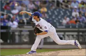  ?? KATHY WILLENS - THE ASSOCIATED PRESS ?? New York Mets starting pitcher Jacob deGrom delivers during the fifth inning of a baseball game against the Atlanta Braves, Monday, June 21, 2021, in New York.