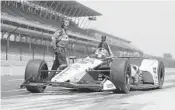  ?? MICHAEL CONROY/AP ?? Graham Rahal pulls out of the pit area during Thursday’s practice session for the IndyCar Indianapol­is 500.