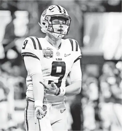  ?? JASON GETZ/USA TODAY SPORTS ?? LSU senior quarterbac­k Joe Burrow accounted for 8 TDs in the Peach Bowl.