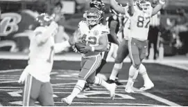  ?? GAIL BURTON/AP ?? Chiefs running back Anthony Sherman celebrates his touchdown Monday night.