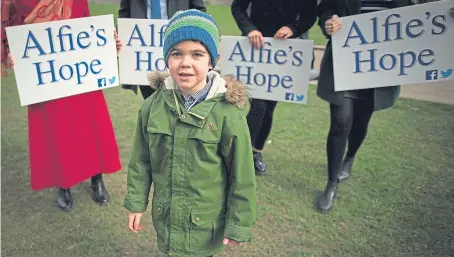  ?? Picture: PA. ?? Six-year-old Alfie Dingley has been authorised to have a licence for use of cannabis oil after his mother Hannah Deacon appealed to Prime Minister Theresa May.