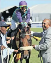  ??  ?? Yogas Govender, 44, has groomed numerous winning horses in his eight years as a horse trainer.