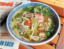  ?? ?? the beef pho noodle soup features a broth that is slowcooked for 16 hours!
