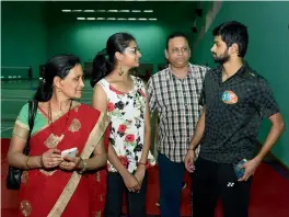  ??  ?? B. Sai Praneeth (right) with family members at the Gopichand Badminton Academy in Hyderabad on Tuesday.