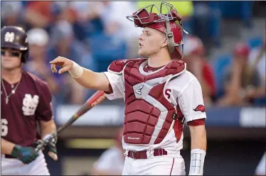  ?? NWA Democrat-Gazette/BEN GOFF ?? Arkansas catcher Grant Koch increased his offensive production significan­tly this season, but the sophomore has been mired in a hitting slump as of late. Koch, who was named first-team All-SEC, is batting .276 with 13 home runs and 42 RBI, but he is...