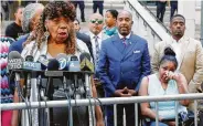  ?? Richard Drew / Associated Press ?? Gwen Carr, mother of Eric Garner, speaks as widow Esaw Snipes listens. “This should have been taken care of years ago, said Carr, insisting the Obama Justice Department would have been fairer.