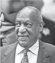  ?? MICHAEL BRYANT/PHILADELPH­IA INQUIRER ?? Bill Cosby looks to the sound of supporters and detractors from the sidewalk of the Montgomery County Courthouse on Sept. 24, 2018.