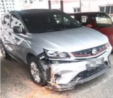  ?? — Malay Mail photo ?? A vehicle parked at the Jay Series condominiu­m was among several damaged by debris from the rock blasting.