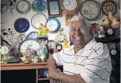  ?? MARK RANDALL/SUN SENTINEL 2013 ?? Santalicio Martinez was known for resetting his clocks for daylight saving time, a process that could take a week.