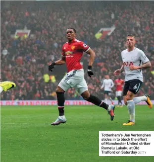  ?? GETTY ?? Tottenham’s Jan Vertonghen slides in to block the effort of Manchester United striker Romelu Lukaku at Old Trafford on Saturday