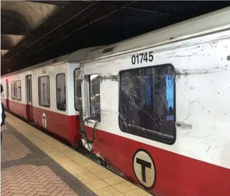  ?? PHOTO COUrTesy elIsabeTH bOyCe-JaCInO, abOve; maTT sTOne / Herald sTaff, belOW ?? ANOTHER DEBACLE: A Red Line train hit part of the platform at Broadway station on Tuesday, causing delays and the need for bus service until the train could be re-railed by MBTA officials. Below, MBTA police block the station from passengers.