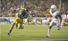  ?? Brian Bahr / Getty Images ?? Cal’s Chad Hansen (6) tops the country with 12.5 receptions per game and is second at 164 receiving yards per game.