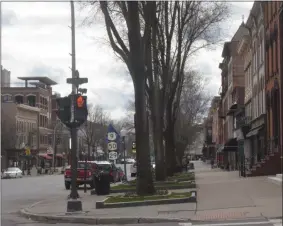  ?? LAUREN HALLIGAN - MEDIANEWS GROUP FILE ?? A sidewalk on Broadway in the business district of downtown Saratoga Springs is empty as locals practice social distancing during the early stages of the COVID-19 outbreak.