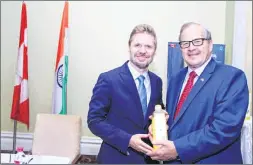  ??  ?? Reeves with MacAulay, during the signing of MoU for Canadian Agro India.