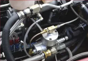  ??  ??  Sullivan’s Ram doesn’t run an intercoole­r, but instead uses a multiple-nozzle water injection kit to keep EGTS under control. A Simpson valve is used to inject the water at an insane 1,000 psi.