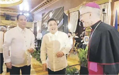  ?? ?? (FROM left) Ferdinand Martin Romualdez (Speaker of the House of Representa­tives), Juan Miguel Zubiri (Senate President) and Charles John Brown III (Papal Nuncio).