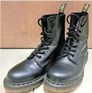  ?? /Karin Mosselson ?? Wobbly boots: Clunky bootmaker Dr Martens has posted a drop of 21% in revenue.