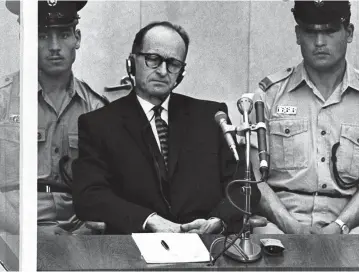  ?? (Reuters) ?? ADOLF EICHMANN listens to court proceeding­s at his trial in Jerusalem, in 1961. The following year, he was executed after being found guilty for crimes against humanity.