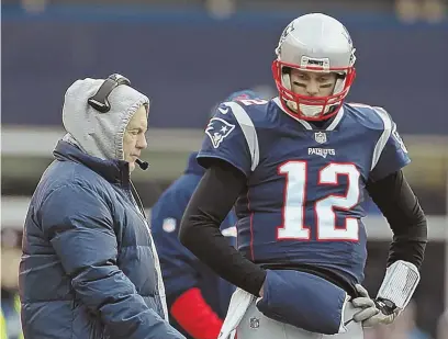  ?? STAFF PHOTO BY NANCY LANE ?? HAVING A TIFF? Tom Brady seemed to be taking a poke at Bill Belichick when he commented on an Instagram post by Malcolm Butler.