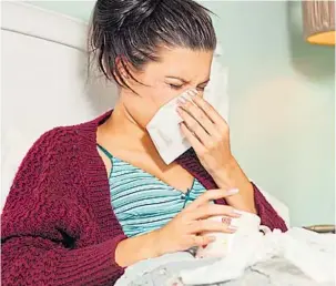  ?? Picture: GETTY ?? FLU BLUES: Many people are just getting over one virus when another strikes