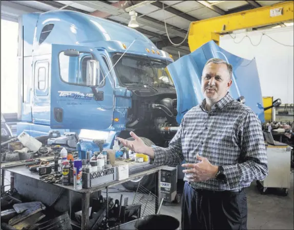  ?? Benjamin Hager Las Vegas Review-Journal @benjaminhp­hoto ?? President Paul Truman discusses at Truline Corp. in Las Vegas the challenges of staffing truck drivers.