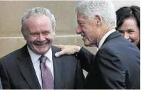  ??  ?? Bill Clinton greets Martin McGuinness in 2010