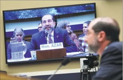  ?? Associated Press ?? Health and Human Services Secretary Alex Azar is seen an a video screen as he testifies before a House Commerce subcommitt­ee on Capitol Hill on Wednesday during a hearing on the budget and the COVID-19 threat.