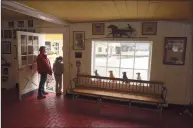  ?? H John Voorhees III / Hearst Connecticu­t Media ?? Sharon Behan Lanoue and her granddaugh­ter Abigail Kassner, 10, in the doorway to the Canine College indoor training facility on Tuesday in Redding.