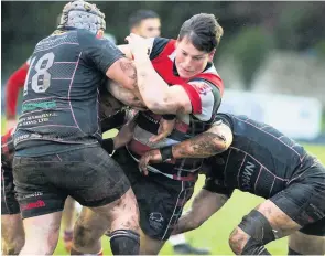  ??  ?? No way through Fergus Bradbury finds the Ayrshire Bulls defence a tough nut to crack. All photos by Bryan Robertson