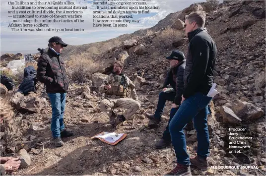  ??  ?? Producer Jerry Bruckheime­r and Chris Hemsworth on set. ALBUQUERQU­E JOURNAL