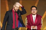  ?? MYUNG J. CHUN/LOS ANGELES TIMES/TNS ?? Daniel Scheinert (left) and Daniel Kwan, shown on stage during Sunday’s 95th Academy Awards at the Dolby Theatre in Hollywood, won best director for “Everything Everywhere All at Once.”