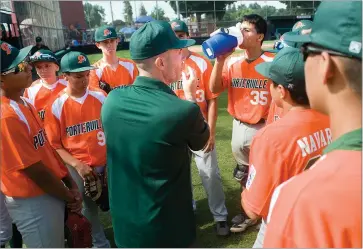  ?? RECORDER PHOTO BY CHIEKO HARA ?? Coach Jeremy Allen, center, talks to his team Sunday, July 8 during the 2018 Senior Division Norcal State Championsh­ip tournament at Shahzade Field at Mt. Whitney High School in Visalia. Portervill­e Senior All-stars lost their first game to Spreckels Park, 0-6, and will play next at 8 p.m. Monday.