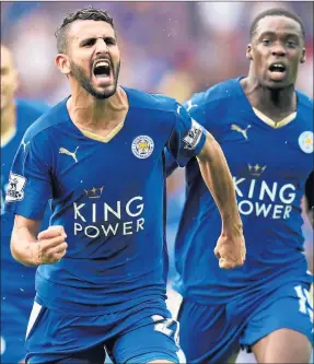  ?? Picture: Getty ?? BLUE DAWN: PFA Player of the Year Riyad Mahrez, right, has been a revelation for Leicester City this season.