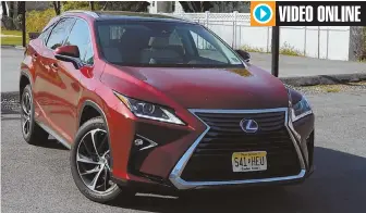  ?? STAFF PHOTO BY JIM MAHONEY ?? WORTH EVERY PENNY: The Lexus RX 450h features sharp styling, including the trademark blacked-out hourglass grille.