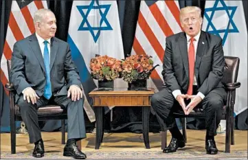  ?? EVAN VUCCI/AP ?? President Donald Trump meets Israeli Prime Minister Benjamin Netanyahu in New York in 2017.