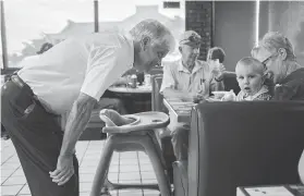  ?? Photos by Marie D. De Jesús / Staff photograph­er ?? Brent Mckee, 61, owner of Mckee’s diner in Paris, greets customers during breakfast. “The law is the law,” he said of the Load Trail raid.