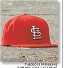  ??  ?? THEODORE PARISIENNE / FOR NEW YORK DAILY NEWS The victim’s St. Louis Cardinals cap lies near the shooting scene in Rainey Park.