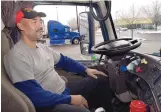  ??  ?? Independen­t truck driver Stan Barnes of Montgomery, Ala., parks in the Wal-Mart parking lot on Eubank NE while waiting for eastbound Interstate 40 to reopen Sunday.