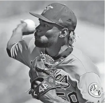  ?? CHRIS O'MEARA/ASSOCIATED PRESS ?? Miguel Castro, who made his Grapefruit League debut for the Orioles on Friday, had his fastball clocked at 97 mph.