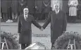  ?? Helmut Kohl (à droite) tenant la main de François Mitterrand en . (Photo MaxPPP) ??