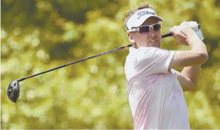  ?? AP PHOTO ?? EYES HAVE IT: Co-leader Ian Poulter, who shot a 7-under 65, watches his tee shot at the 15th hole during yesterday’s third round of the Houston Open in Humble, Texas.