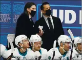  ?? DAVID ZALUBOWSKI — THE ASSOCIATED PRESS ?? San Jose Sharks coach Bob Boughner, right, confers with assistant coach Mike Ricci during the team’s game against the Colorado Avalanche on Tuesday in Denver.