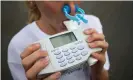  ?? Photograph: Justin Tallis/AFP/Getty Images ?? A woman blows into a spirometer.