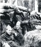  ?? PA ?? British soldiers in a trench in France with paper hats from Christmas crackers