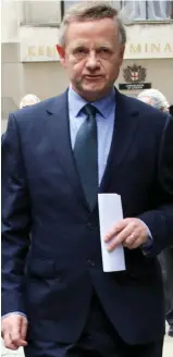  ??  ?? Cleared: Andrew Hill leaves the Old Bailey after his acquittal yesterday