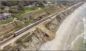  ?? Jarrod Valliere San Diego Union-Tribune ?? A PROPOSED tunnel would relocate track on an ocean bluff in Del Mar that is in danger of collapsing.